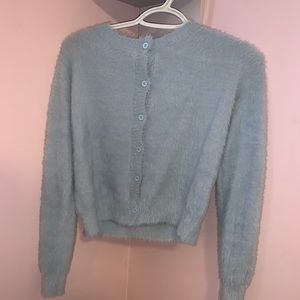 Fluffy blue cropped button up sweater